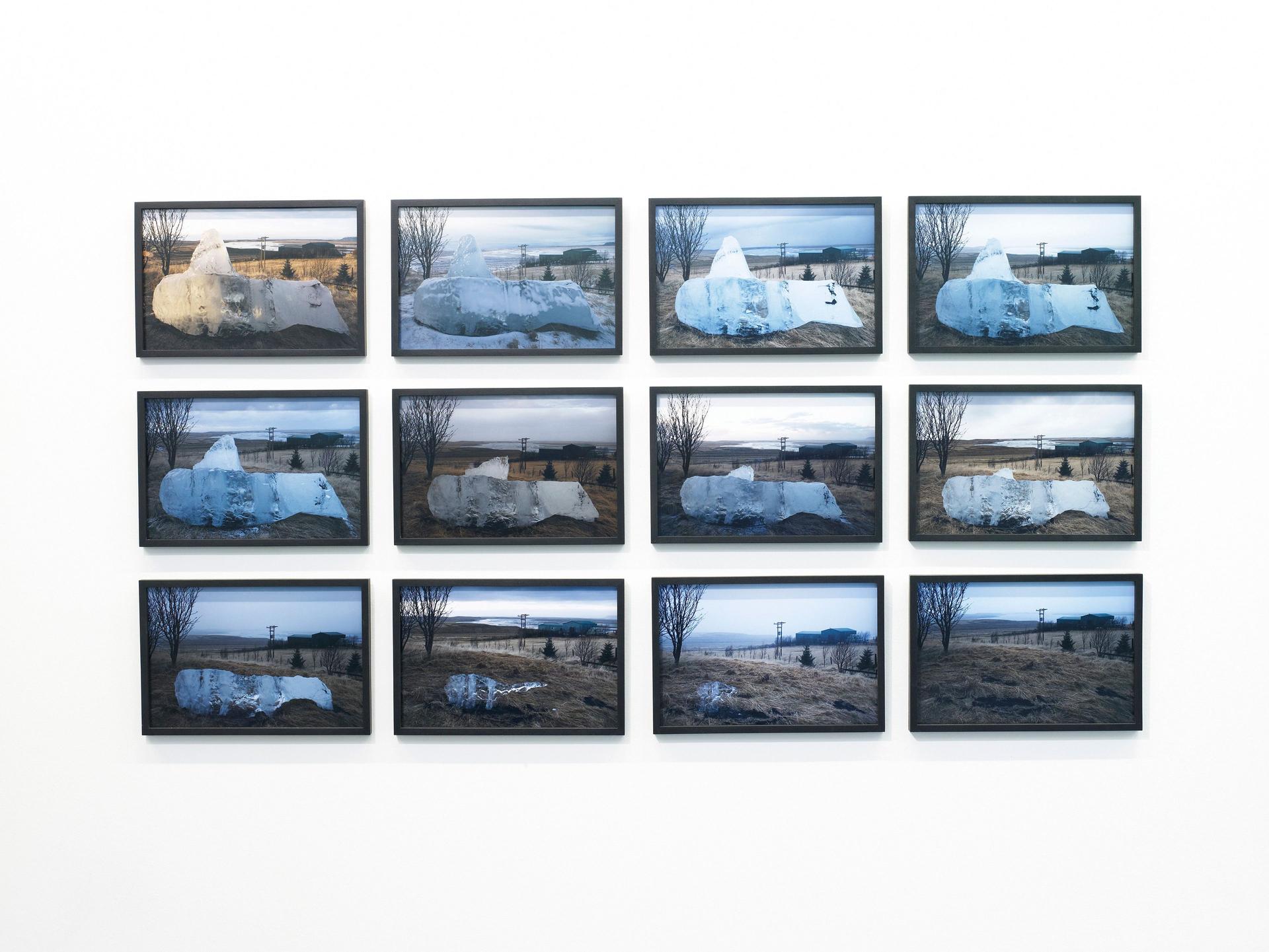 Installation view of Melting ice on Gunnar’s land (2008), Olafur Eliasson. Twelve framed photographs are displayed in three rows of four, documenting the gradual melting of an ice block in an Icelandic landscape.